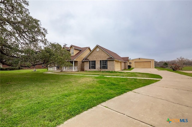 view of front facade featuring a garage and a front lawn