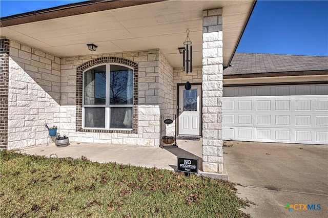 property entrance with a garage