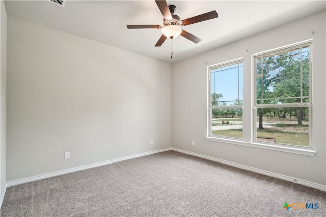 4049 Hickory Forrest Dr, Seguin, TX 78155 - carpeted empty room featuring baseboards and a ceiling fan