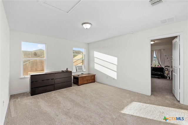 bedroom with light colored carpet