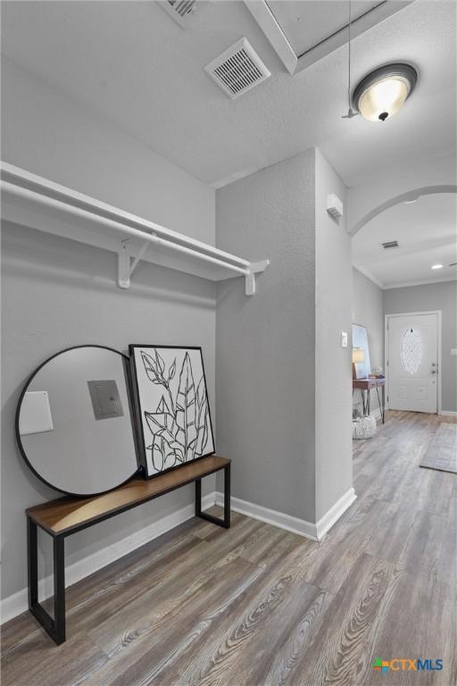 hallway featuring hardwood / wood-style floors