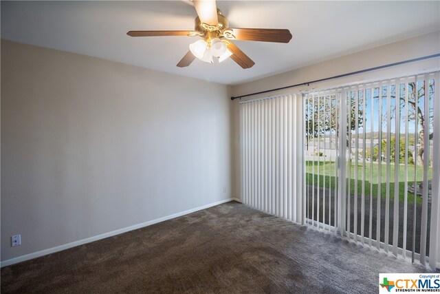 empty room featuring carpet flooring and ceiling fan