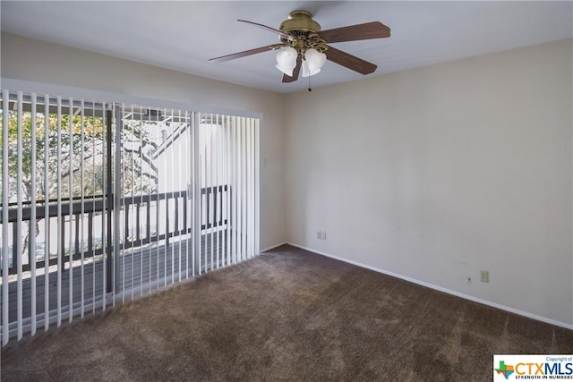 unfurnished room with ceiling fan and carpet