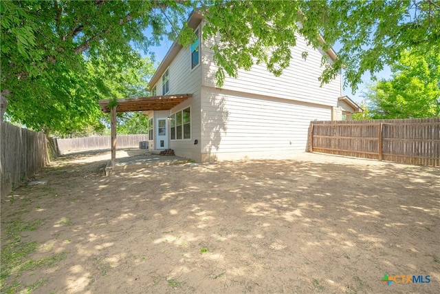 253 Flushing, New Braunfels, TX 78130 - exterior space with a fenced backyard and central air condition unit