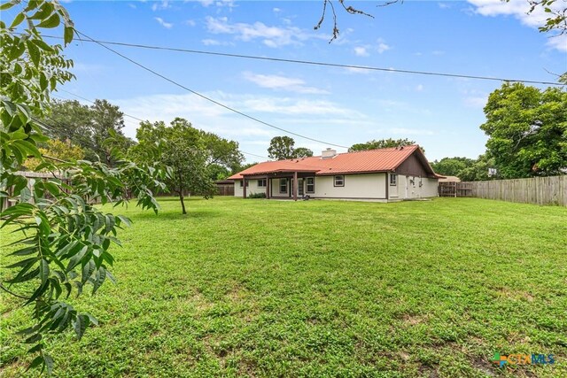 111 Warwick Glen St, Victoria, TX 77904 - back of house with a fenced backyard