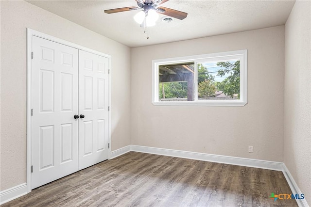 111 Warwick Glen St, Victoria, TX 77904 - unfurnished bedroom featuring wood finished floors, a closet, and ceiling fan