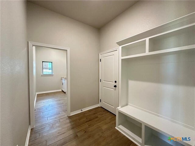 2032 Yarrow Rd, Temple, TX 76502 - mudroom with dark wood-style floors and baseboards