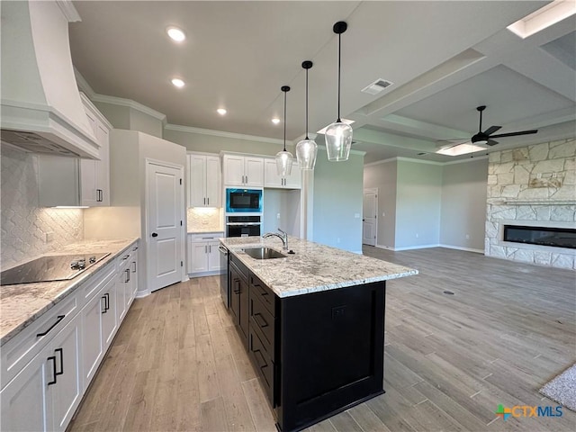 2032 Yarrow Rd, Temple, TX 76502 - kitchen featuring custom range hood, black appliances, crown molding, a ceiling fan, and white cabinetry