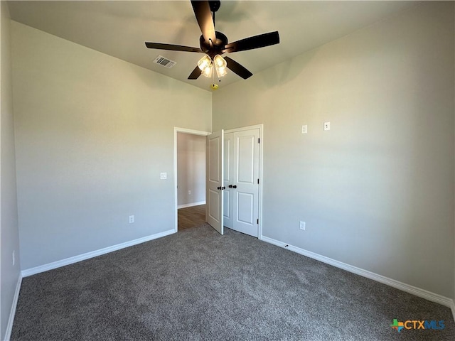 2032 Yarrow Rd, Temple, TX 76502 - empty room with dark carpet and a ceiling fan
