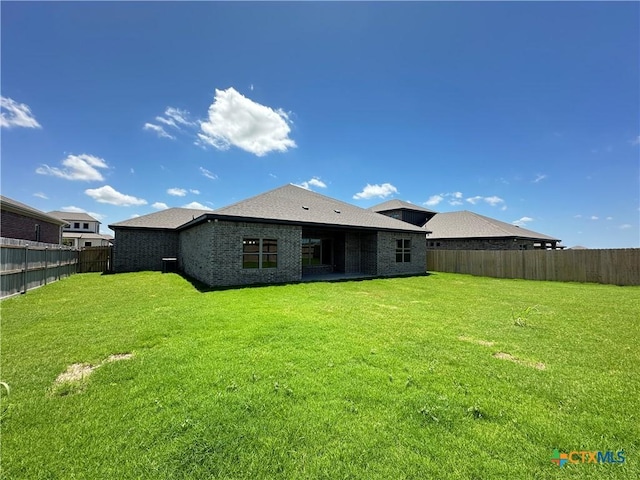 2032 Yarrow Rd, Temple, TX 76502 - rear view of property with a fenced backyard