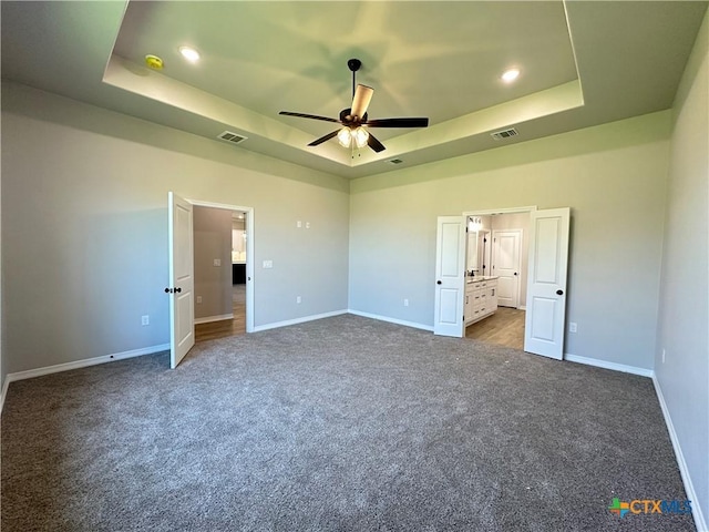 2032 Yarrow Rd, Temple, TX 76502 - unfurnished bedroom with a tray ceiling, carpet floors, recessed lighting, and a ceiling fan