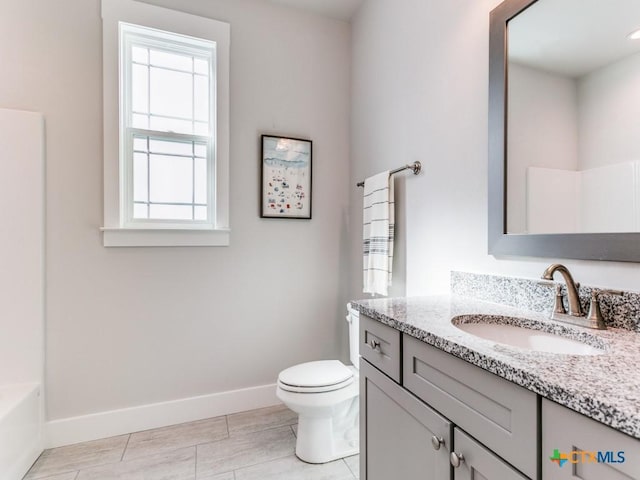 full bathroom with vanity, toilet, and tub / shower combination