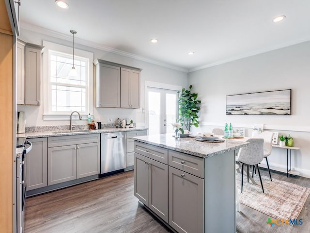175 Lost Maples Way, Marion, TX 78124 - kitchen featuring stainless steel dishwasher, gray cabinets, light wood-style floors, healthy amount of natural light, and crown molding