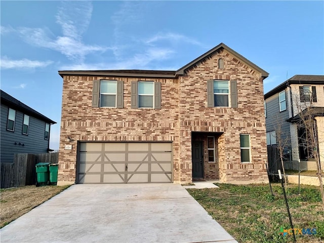 view of front of house with concrete driveway, brick siding, fence, and an attached garage