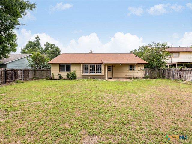 1304 Wroxton Way, Round Rock, TX 78664 - back of house with a patio and a fenced backyard