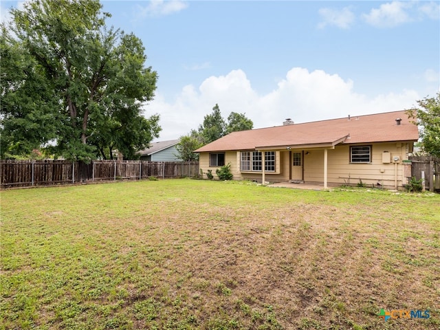 1304 Wroxton Way, Round Rock, TX 78664 - fenced backyard with a patio