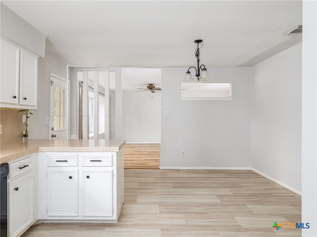 1304 Wroxton Way, Round Rock, TX 78664 - kitchen with a ceiling fan, white cabinets, light countertops, and light wood-style floors