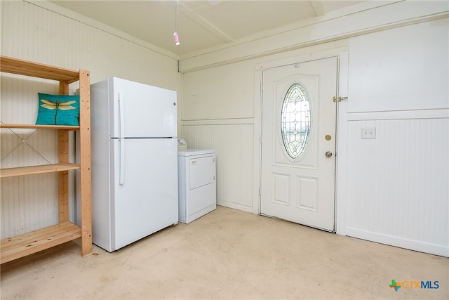 clothes washing area featuring washing machine and dryer