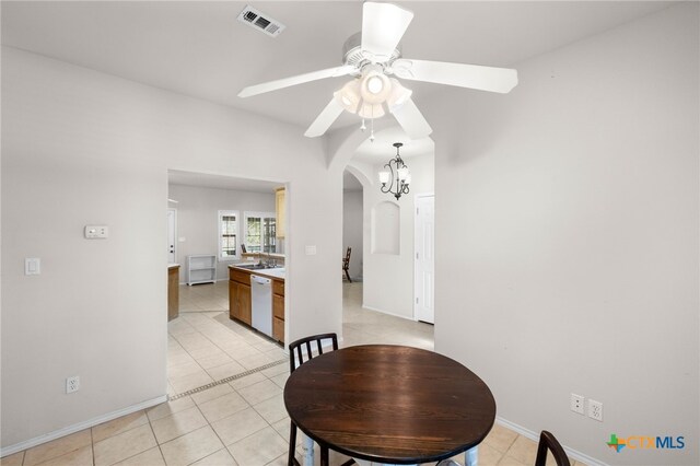 dining room with ceiling fan and light tile patterned floors