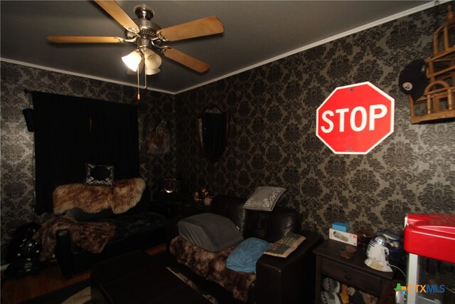 bedroom featuring ceiling fan and crown molding