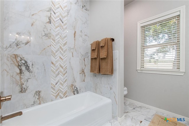 bathroom with toilet and shower / washtub combination