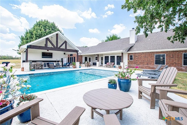 view of pool with a patio