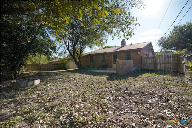 back of house featuring a patio area