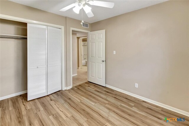 105 Concord Ln, Victoria, TX 77901 - unfurnished bedroom featuring a closet, light wood finished floors, baseboards, and ceiling fan