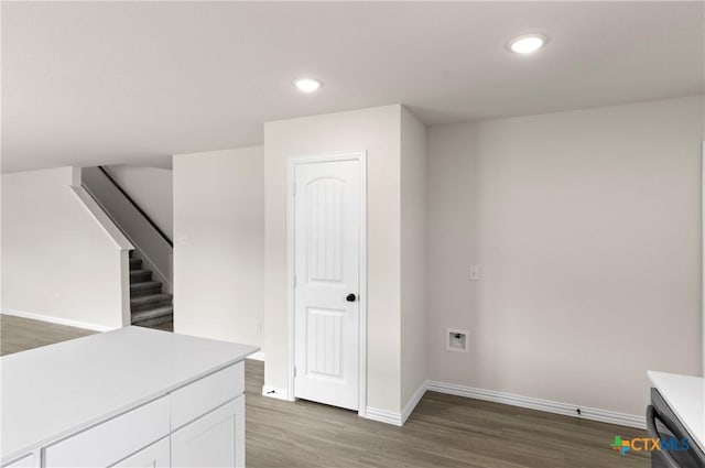 3816 Poteet Ct, Temple, TX 76504 - basement featuring light wood-style floors, stairs, and recessed lighting
