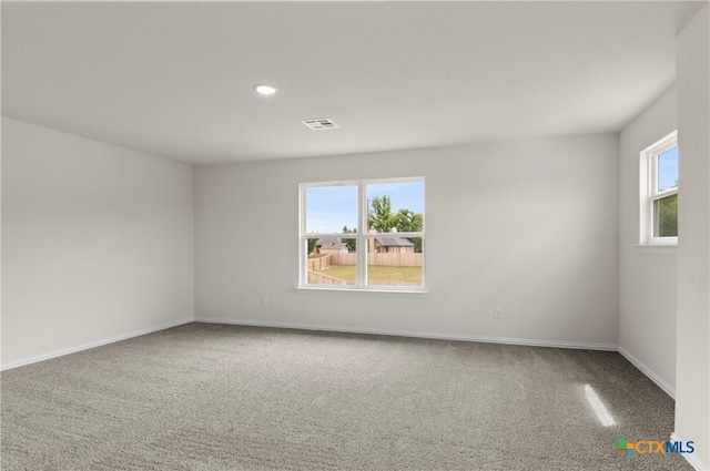 3816 Poteet Ct, Temple, TX 76504 - empty room with plenty of natural light, carpet flooring, and recessed lighting