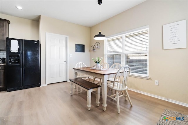 325 Franchi Way, New Braunfels, TX 78130 - dining space with light wood finished floors and baseboards