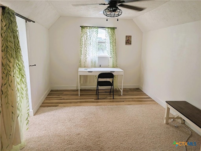 127 Forest Mist, Canyon Lake, TX 78133 - office area with lofted ceiling, a ceiling fan, baseboards, a textured ceiling, and wood finished floors