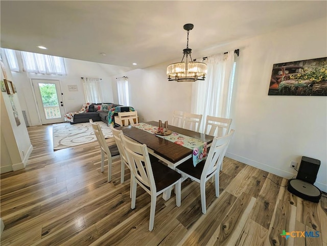 127 Forest Mist, Canyon Lake, TX 78133 - dining area featuring recessed lighting, light wood-style flooring, a chandelier, and baseboards