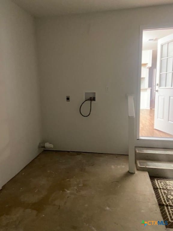 1025 E Fannin St, Luling, TX 78648 - laundry area featuring hookup for an electric dryer and hookup for a washing machine