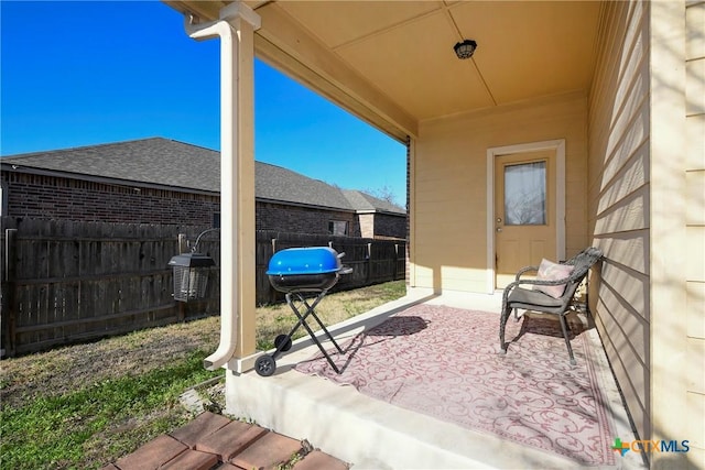 view of patio with fence