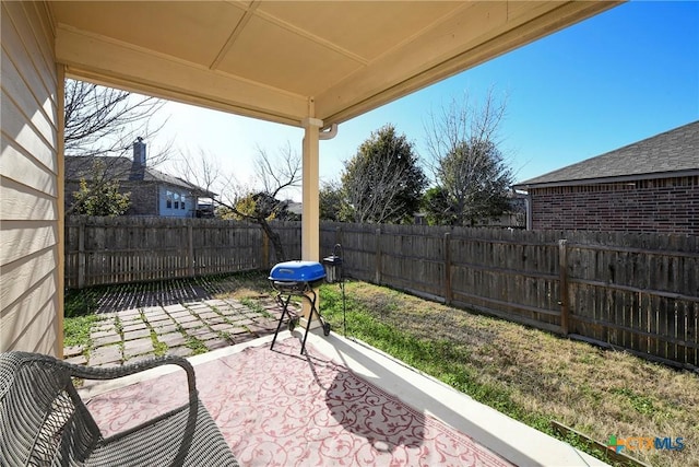 view of patio / terrace featuring a fenced backyard