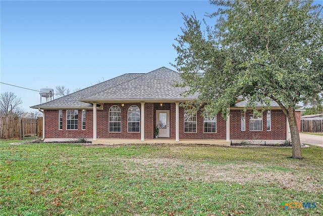 ranch-style house with a front lawn