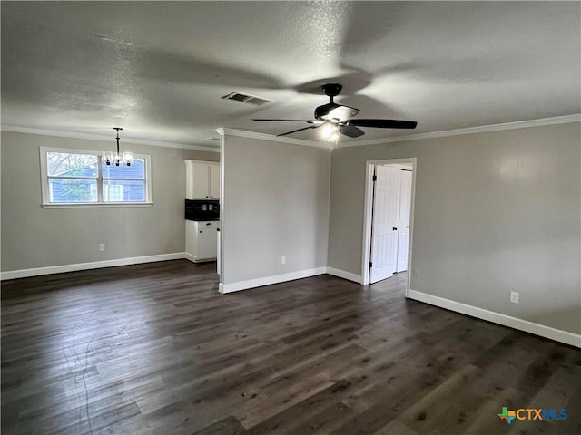 unfurnished room featuring a textured ceiling, dark hardwood / wood-style flooring, ceiling fan with notable chandelier, and ornamental molding