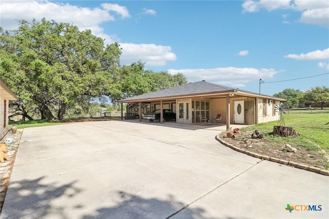 103 Misty Bnd, Floresville, TX 78114 - exterior space with driveway and a front yard