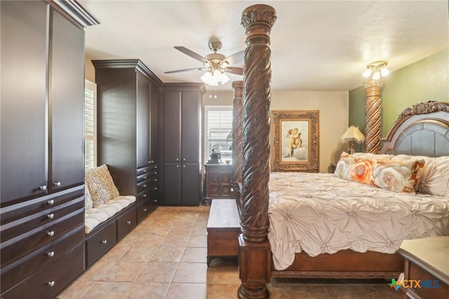 103 Misty Bnd, Floresville, TX 78114 - bedroom featuring ceiling fan and light tile patterned floors
