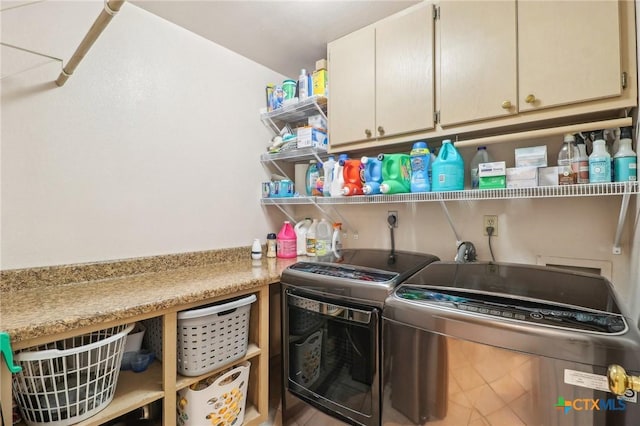 103 Misty Bnd, Floresville, TX 78114 - washroom with washing machine and clothes dryer and cabinet space