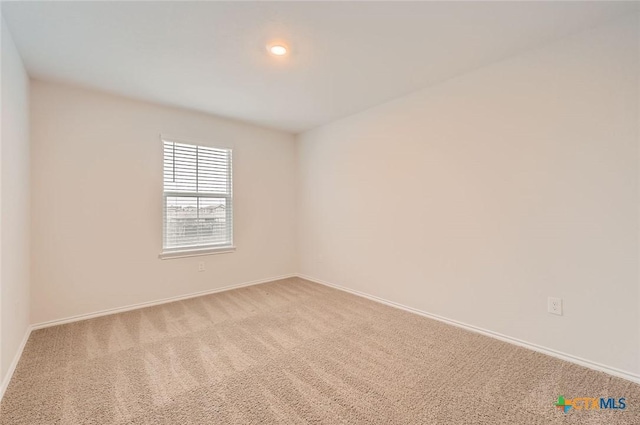 12039 Kettle Riv, San Antonio, TX 78245 - empty room with baseboards and carpet