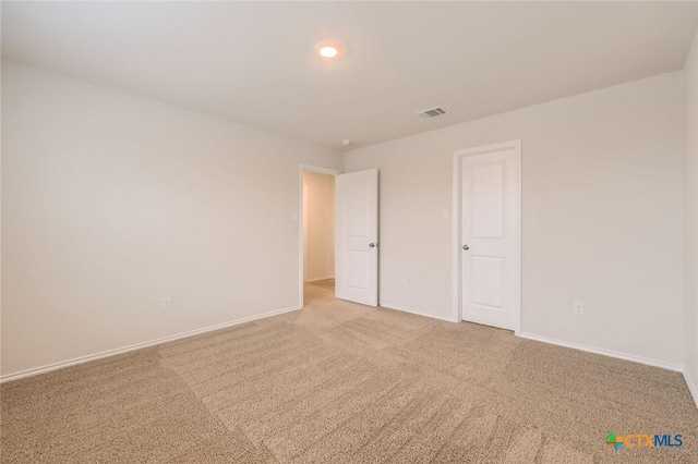 12039 Kettle Riv, San Antonio, TX 78245 - spare room with light carpet and baseboards