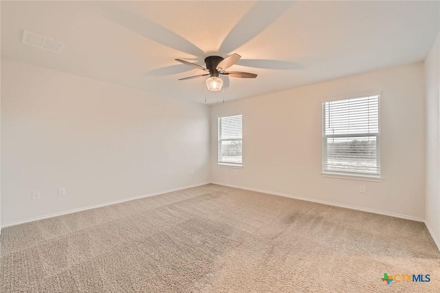 12039 Kettle Riv, San Antonio, TX 78245 - empty room featuring a ceiling fan, carpet floors, and baseboards