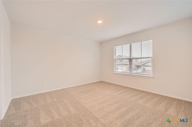 12039 Kettle Riv, San Antonio, TX 78245 - unfurnished room featuring carpet floors, baseboards, and recessed lighting