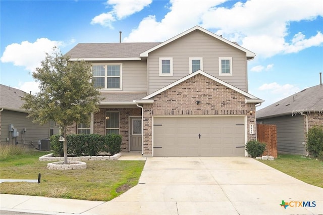 view of front of home featuring a garage, central AC, and a front yard