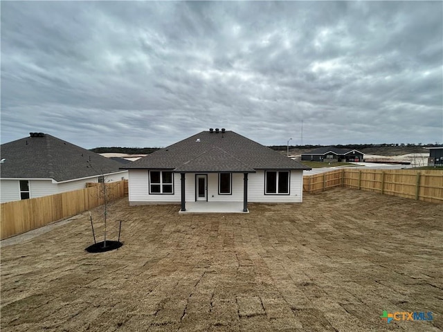 back of house featuring a patio area