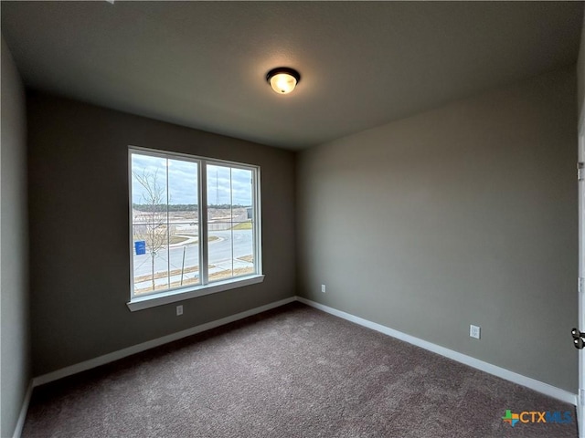 view of carpeted spare room