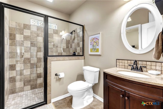 bathroom featuring vanity, tile patterned flooring, decorative backsplash, toilet, and a shower with shower door