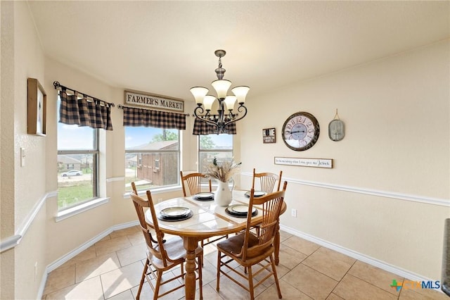 2006 Jesse Dr, Copperas Cove, TX 76522 - dining space with baseboards, an inviting chandelier, and light tile patterned floors